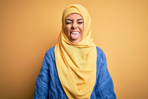 Muslim lady with tongue out